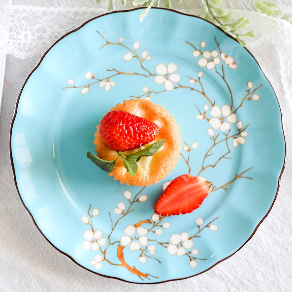 Grado Superior hueso taza de café de China conjunto británico a la hora del té por la tarde de porcelana tazas de té y platillos postre placa plana de de té