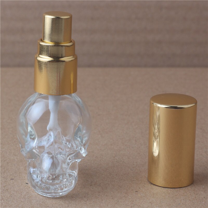 1 stuks 8 ml 3D Schedel Reizen Parfum Flessen MIni Navulbare Parfum Verstuiver Draagbare Glazen Fles met 10 colours: Goud