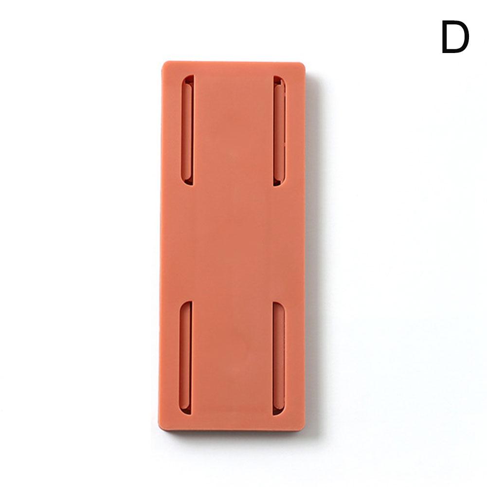 Punchfree-Soporte adhesivo para enchufe, fijador de pared, tira de alimentación, enchufes de almacenamiento, soporte de estante, gancho extraíble: Naranja