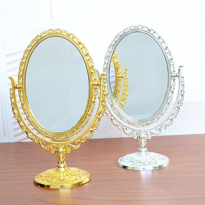 1pc europæisk stil kosmetisk spejl desktop makeup spejl retro dobbeltsidet ovalt spejl til hjemmebadeværelse soveværelse (sølv)