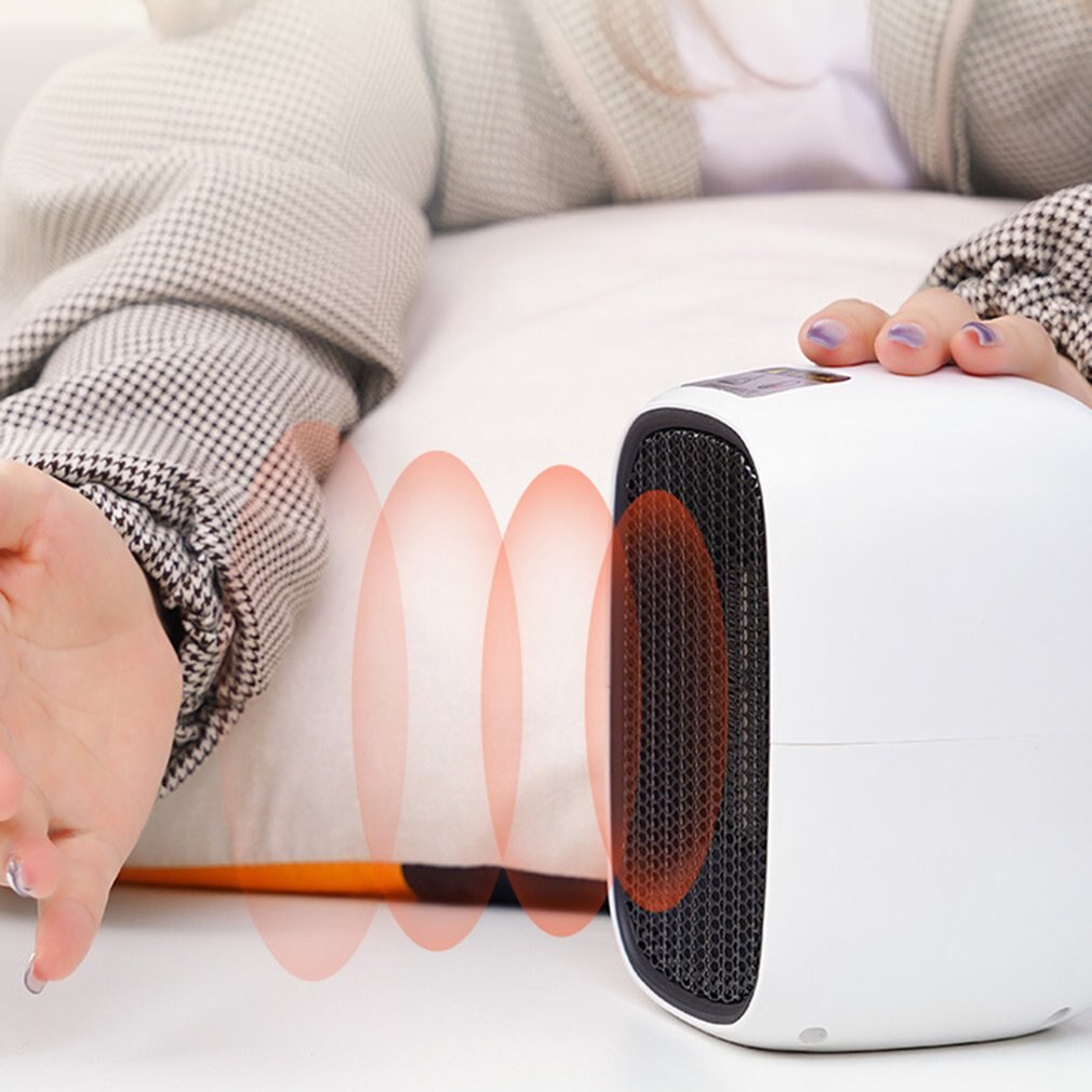 Huishoudelijke elektrische kleine kachel desktop snel verwarmende stille kachel draagbare energiebesparende elektrische kachel