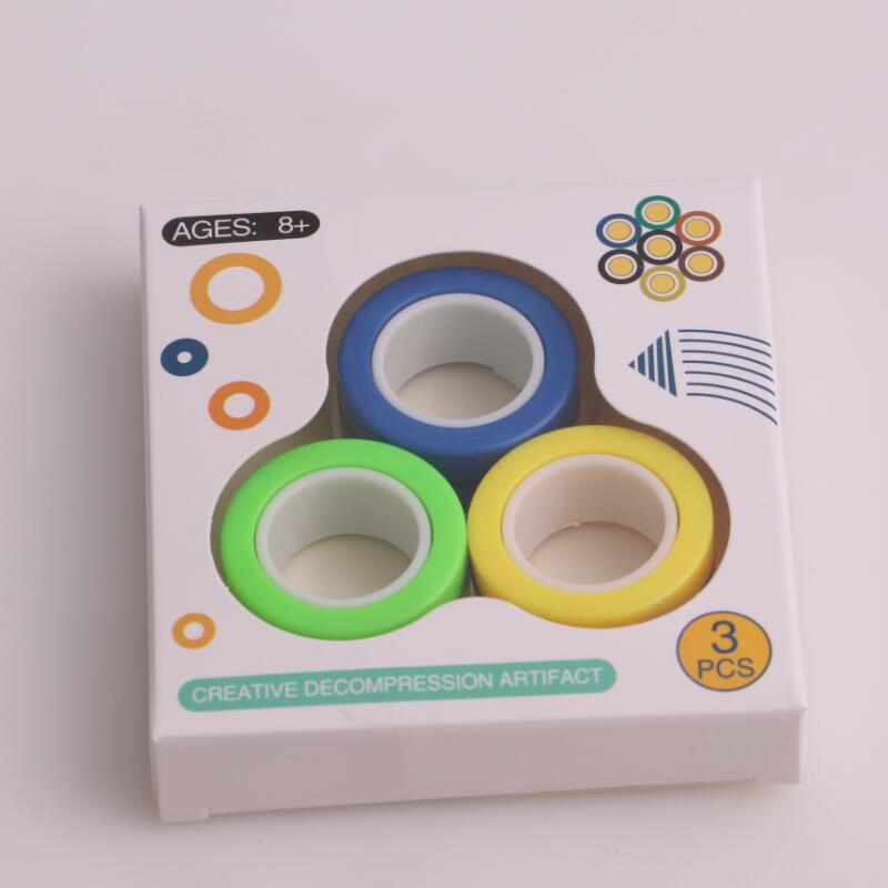 Anti-stress magnetiska magiska ringar packa upp leksaker för magiker trick rekvisita dekomprimering magiska trick små ornament: Gulblå grön