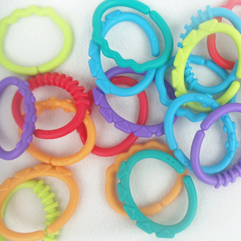 8 pcs Baby Teether toddler toys Rubber Rainbow Ring Safety Molars Rattle Colorful crib mobile Decoration Stroller Hanging