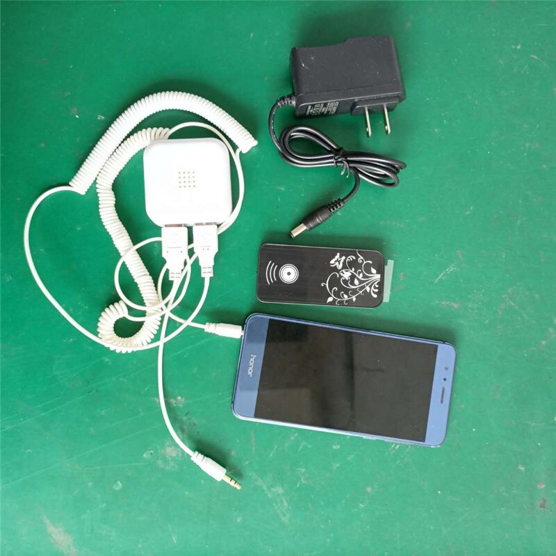 2-port secure displaying mobile phone and other electronics, Anti theft alarm system