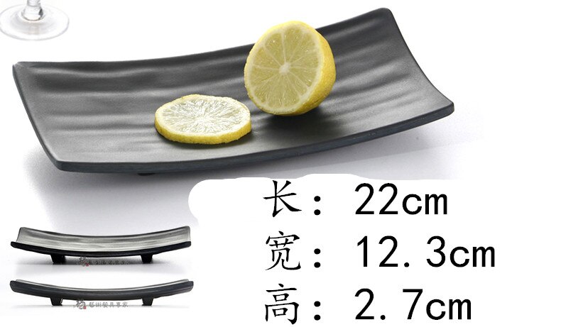 Den sorte service melamin tallerken med rektangulær sushi snack ret japansk restaurant