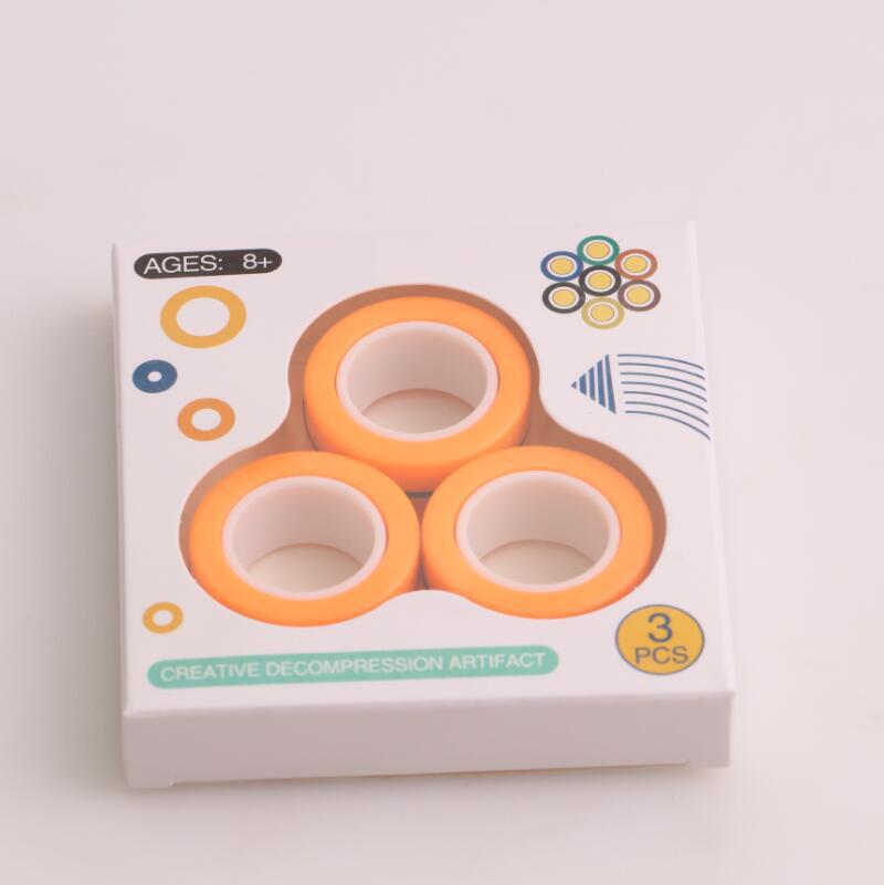 Anti-stress magnetiska magiska ringar packa upp leksaker för magiker trick rekvisita dekomprimering magiska trick små ornament: Orange