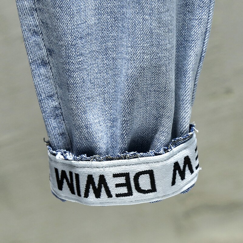 Elastiske denim jeans bogstaver trykt små fødder jeans hip hop løbesko joggers plus størrelse 38 mænds harembukser