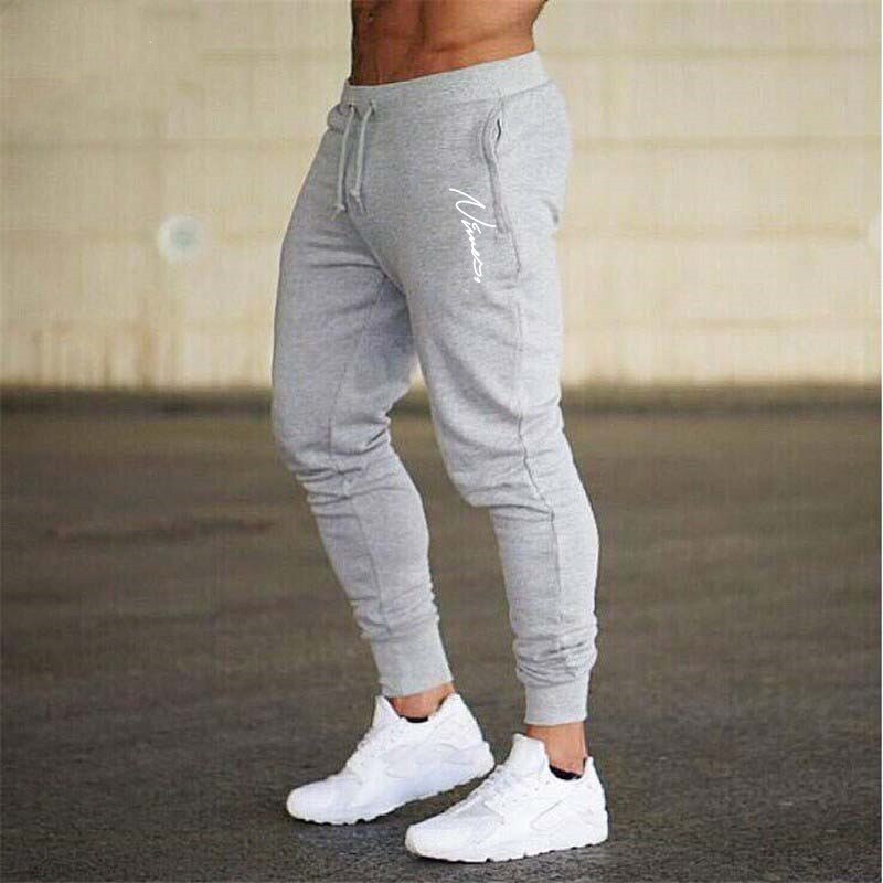 Pantalons de jogging d'été pour hommes, pantalons décontractés, pantalons de survêtement pour hommes, pantalons de sport, de fitness, de hip-hop, élastiques: L / Gris