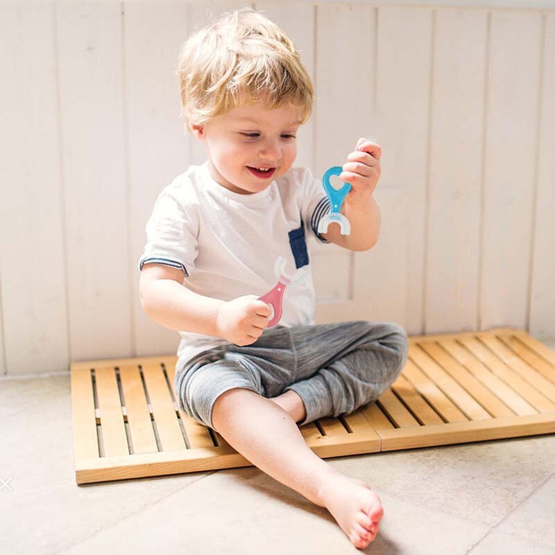 Spazzolino da denti per bambini nuovi U spazzolino da denti in silicone cura dei denti per bambini manuale per la pulizia della bocca modello di cartone animato versione manuale