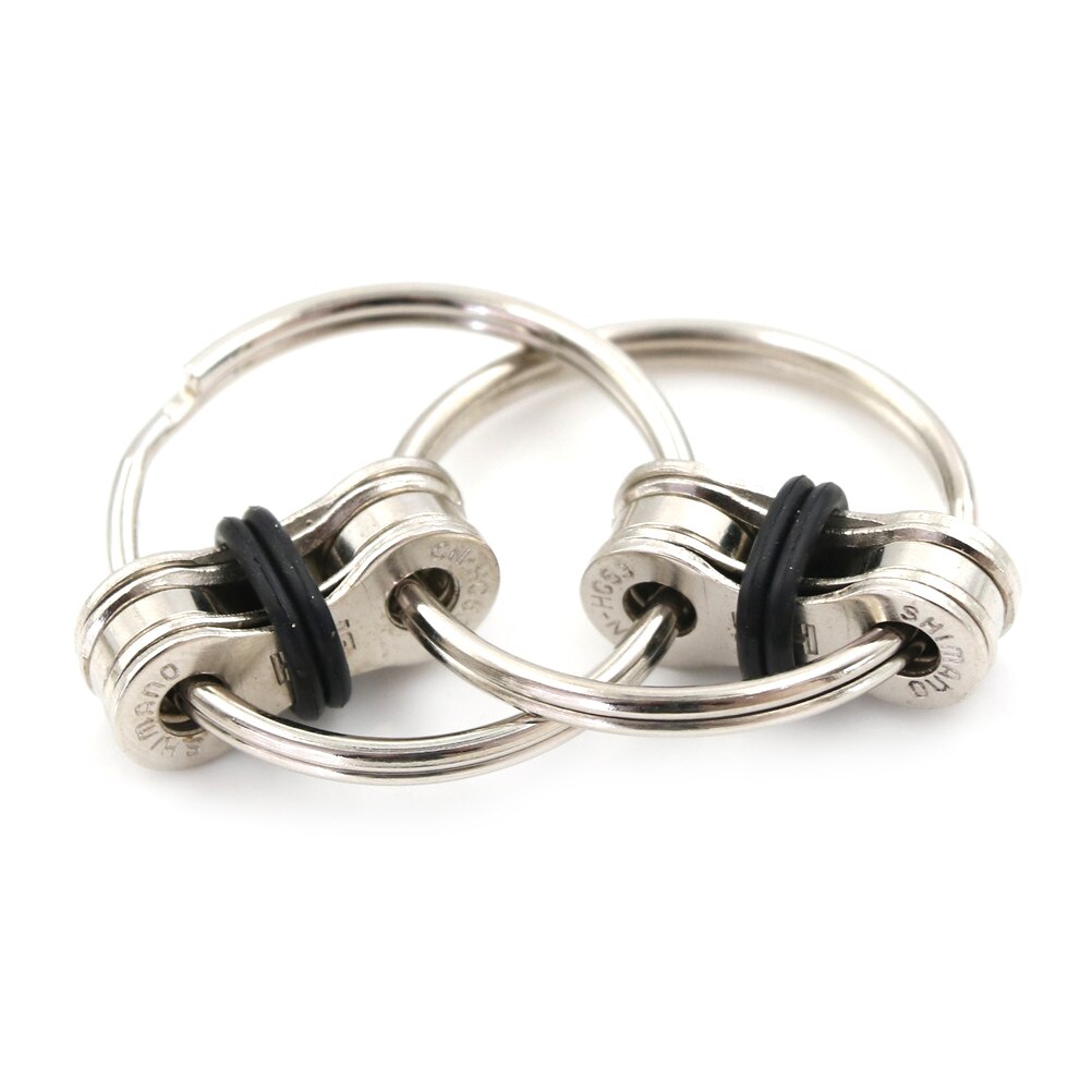 1 pezzo disponibile portachiavi Spinner a mano/Fidget Vent riduzione della pressione catena decompressione per adulti bavaglio giocattolo e scherzi pratici: BK