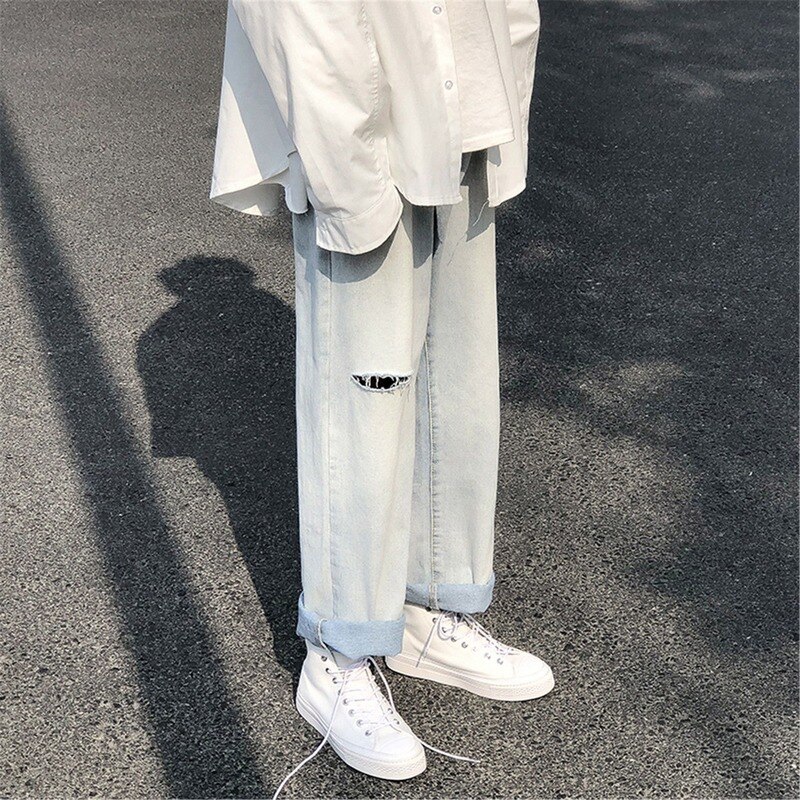 Męskie jeansy dzikie nogawki do kostek cienkie proste workowate spodnie rekreacyjne z dziurami spodnie jeansowe męskie wszystkie mecze stylowe Streetwear