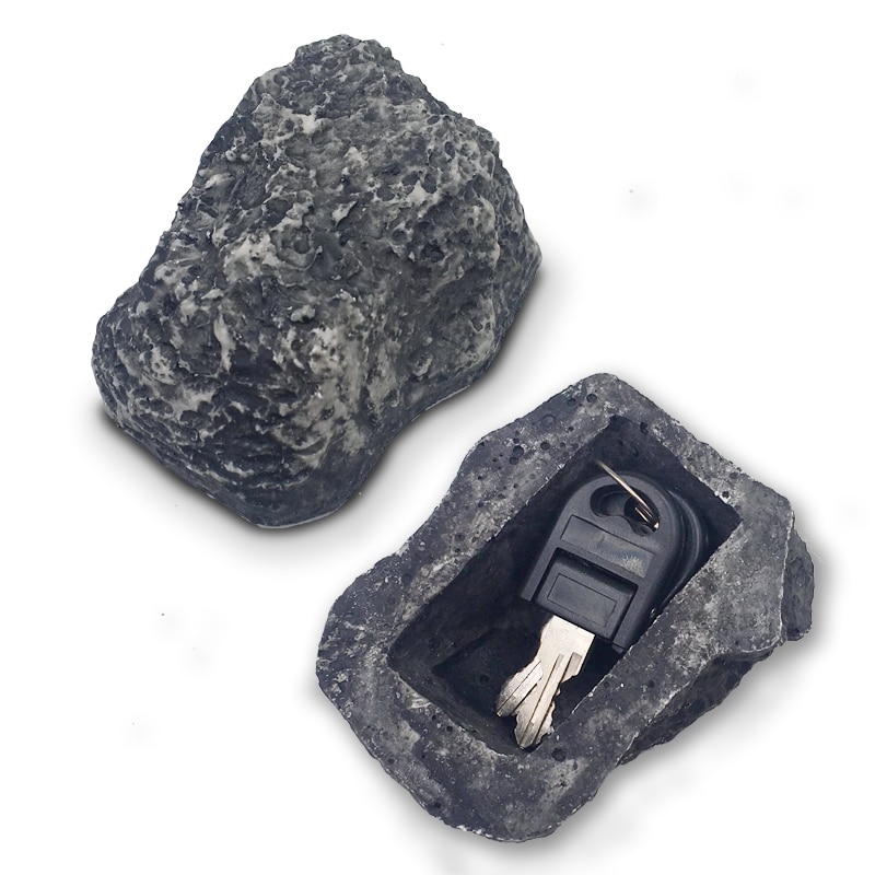 Ulkona puutarhan turva -avain rock -laatikko piilotettu piiloutumaan kiven turvallisuuteen turvallinen varastointi piilossa