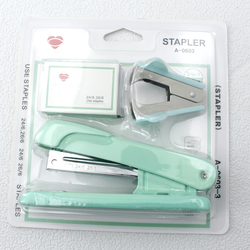 Stapler, staple remover, and staple set - a handy and stylish desktop stapler, perfect for home office use.: green