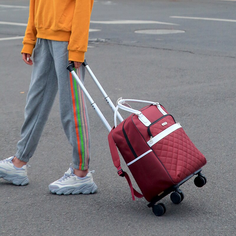 Kvinder vogn bagage rullende kuffert rejse hånd slipsestang rygsæk afslappet rullende sag rejsetaske hjul bagage kuffert