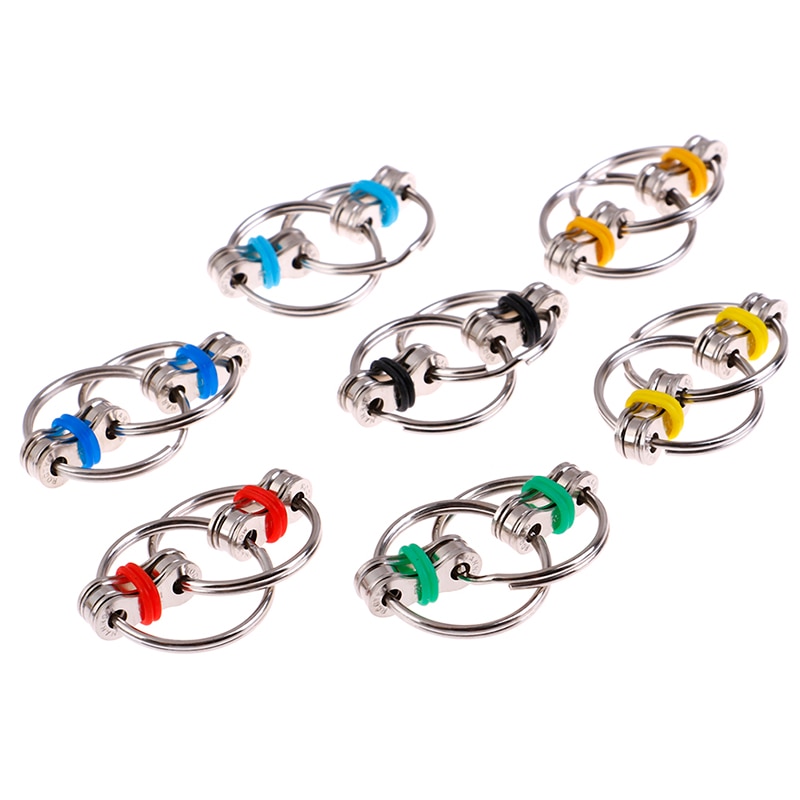 1 pezzo disponibile portachiavi Spinner a mano/Fidget Vent riduzione della pressione catena decompressione per adulti bavaglio giocattolo e scherzi pratici: randomly