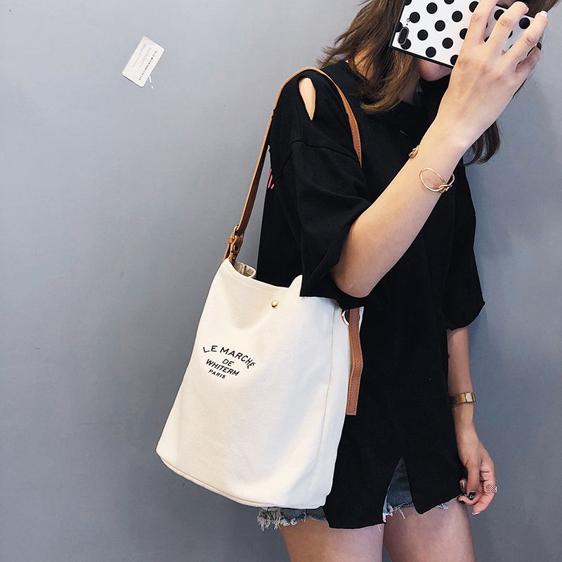 Femmes sacs à main décontractés sacs à bandoulière respectueux de l'environnement Portable lettre motif étudiant sacs sac à provisions