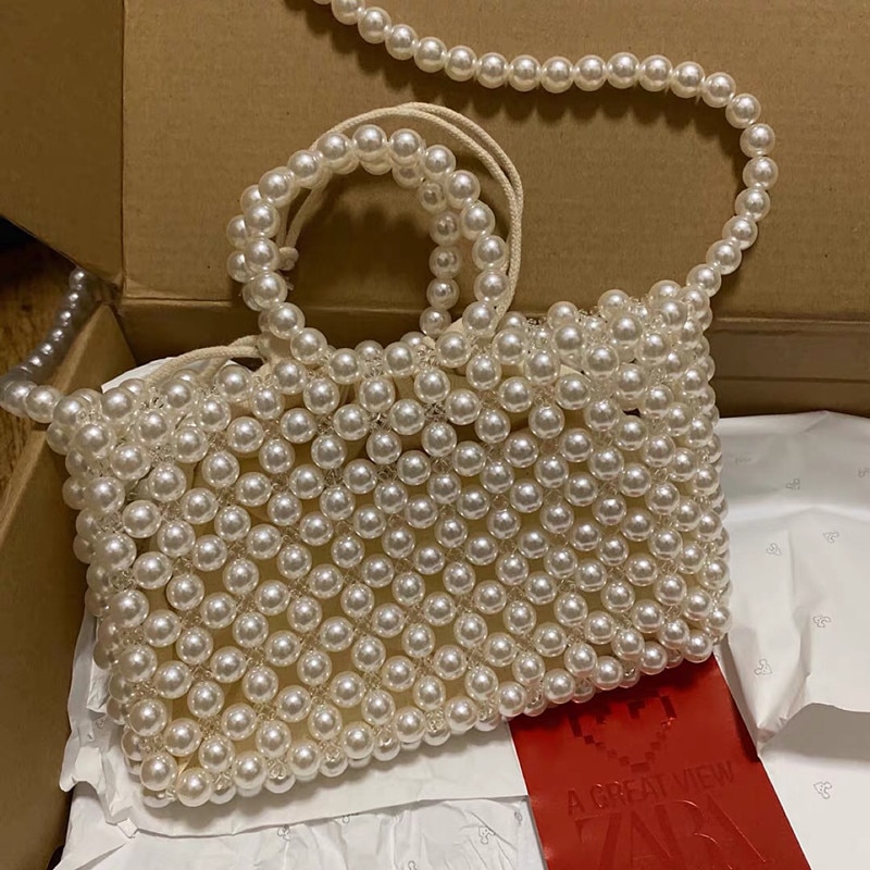Za pearl armband väska bärbar halm vävd väska pärlstav axelväska crossbody väska