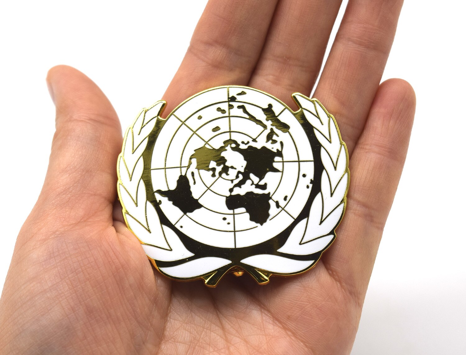 United Nations Peacekeeping Force UN BLUE BERET Hat Badge UN Gold Badge