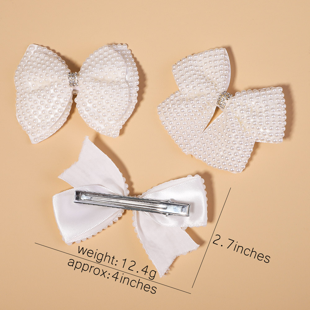 Nuevos lazos para el cabello de perlas blancas con pinzas para el cabello para niñas y niños, capas de Boutique, lazos centrales de diamantes de imitación ostentosos, horquillas, accesorios para el cabello