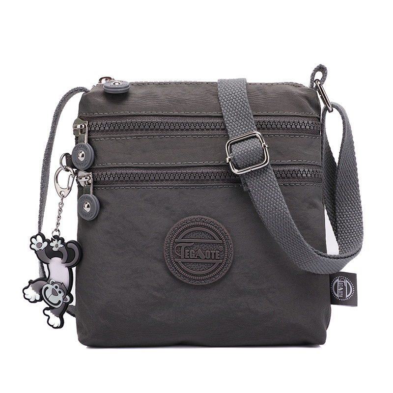 Bolso de hombro para mujer, bolso informal ligero de nailon resistente al agua, bolso de mensajero versátil a la , bolso cruzado pequeño de lona para hombre: Gris oscuro