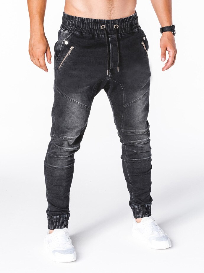 Höstens europeiska och amerikanska tvättade denimtyg för män sportbyxor och benvärmande jeans