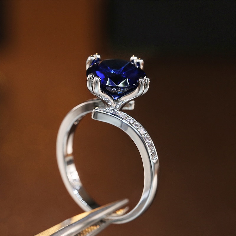 Huitan Klassieke 4 Karaats Imitatie Blue Cz Bridal Wedding Ring Engage Ring Voor Vrouwen Luxe Prachtige Zilveren Kleur Sieraden