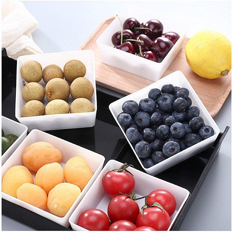 Efterrätt tallrik bricka plast torr frukt snack godis låda nötter melon förvaringslåda te mat maträtt kök arrangör