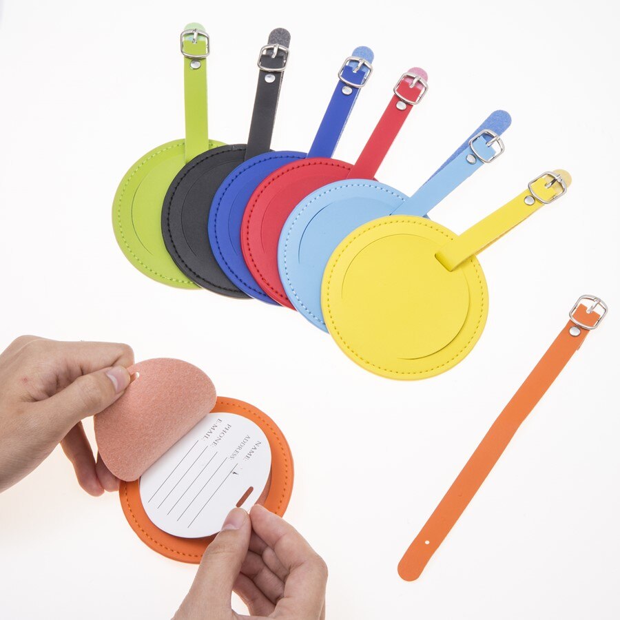 Etiqueta rótulo de equipaje redondo de cuero, colgante para bolso, accesorios de viaje, etiquetas de dirección de identificación, LT27B, venta