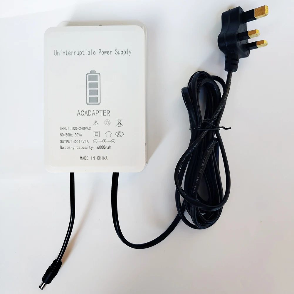 DC12V-2A 6000mAh fuente de alimentación ininterrumpida Mini UPS interfaz de respaldo de batería adaptador de fuente de alimentación ininterrumpida: Naranja