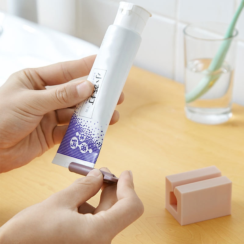 1 stk tandpasta dispenser plast tandpasta rørpresser nyttig multifunktionel tandpasta rullende holder til hjemmebadeværelse