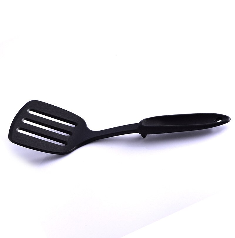 non-stick plastic nylon kitchen utensils high temperature cooking spoon shovel kitchen tools: Leaking shovel