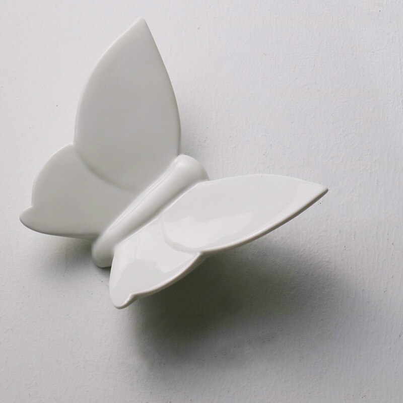 Creatividad cerámica mariposa montaje en pared Fondo estereoscópico pared decoración moderna del hogar Decoración colgante para habitación de niños: Blanco / 8.5x11cm