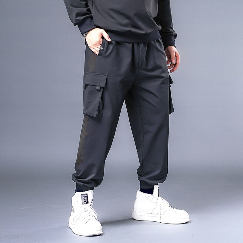 Pussihousut miehet hip hop katumuotit rahtihousut iso koko 7xl collegehousut miesten lenkkeilijä oversize housut musta  hx531