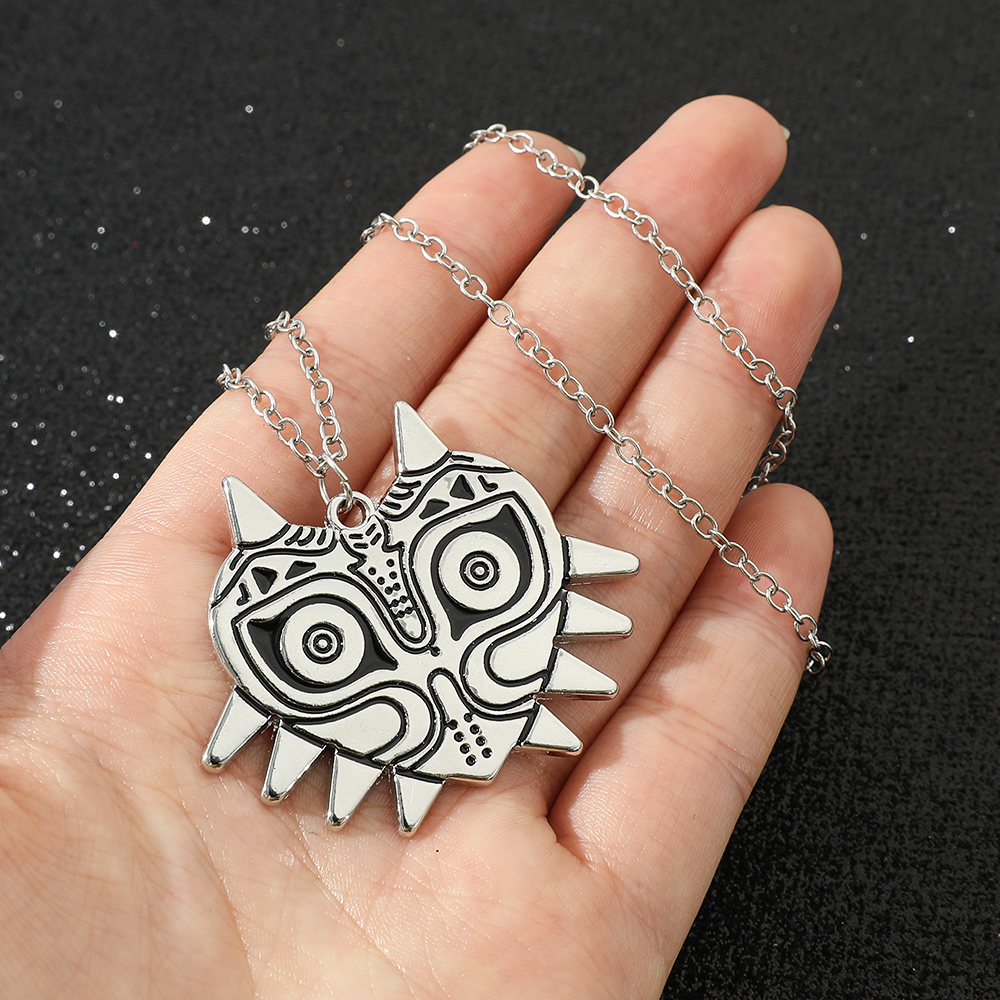La légende du collier bouclier hylian oeil de Sheikah masque de Majora épée triforce symbole pendentif Zelda larmes du royaume
