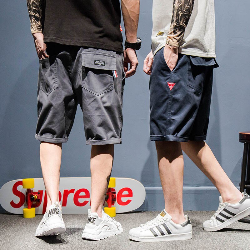 Utomhus sommar lös hiphop vandring klättring resa camping last bomullsoverall resår midja tonåringar shorts män
