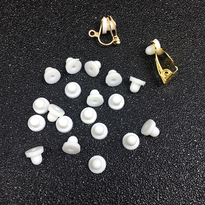 100 pz/lotto Clip per l&#39;orecchio anti-dolore Pad fai da te Clip fatta a mano su cuscinetti in gomma per orecchini tappi per le orecchie in gomma morbida bianca accessori per orecchini JF54