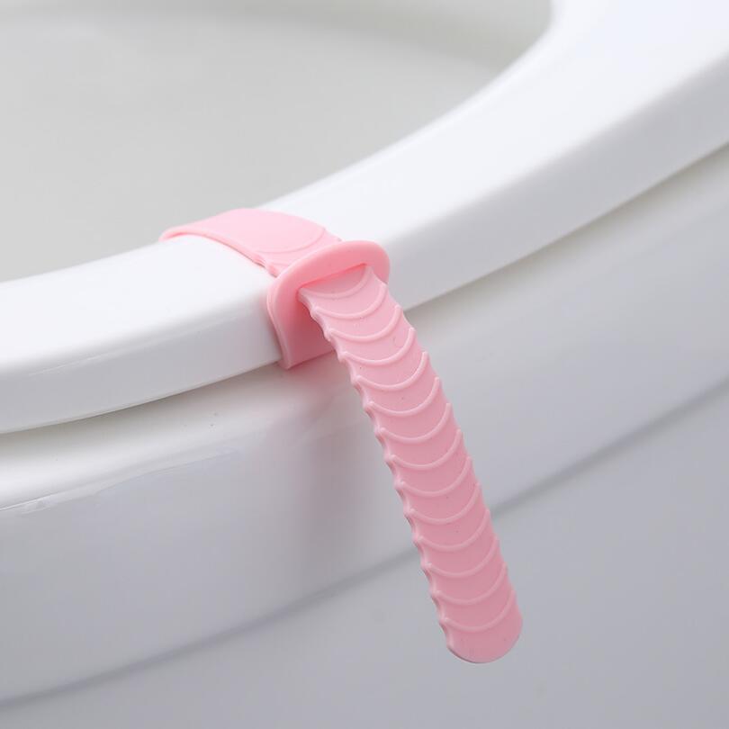 Silikone pink / blå toiletdæksel anti-snavset åbent toilet hygiejnisk afdække håndtag toiletdæksel tilbehør