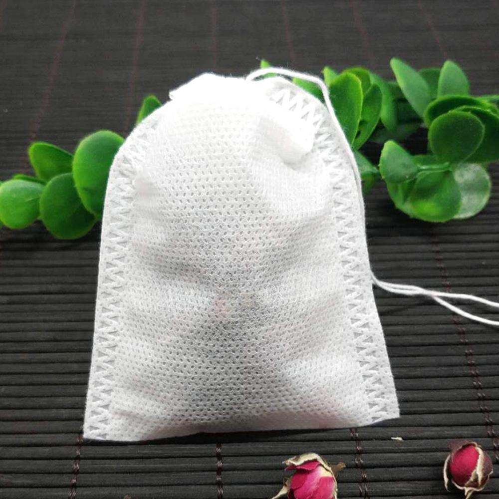 100 st tomma tepåsar engångsdragsko non-woven tyg te ört filterpåse påse tepaket påsar örtinfusers filter