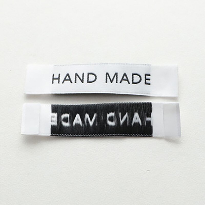 100pz Etichette Etichette di Abbigliamento in Rilievo Fatti A Mano di Stoffa FAI DA TE Etichetta Bandiera etichetta per Abbigliamento Accessori di Cucito Nero Bianco 1.4x5.5cm