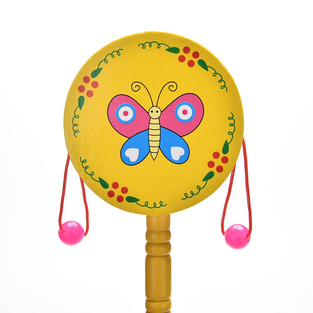 Sonajero tradicional chino para bebés y niños, juguetes giratorios de tambor, sonajero de tambores de madera, instrumento Musical, campana de mano de dibujos animados, 1 Uds.