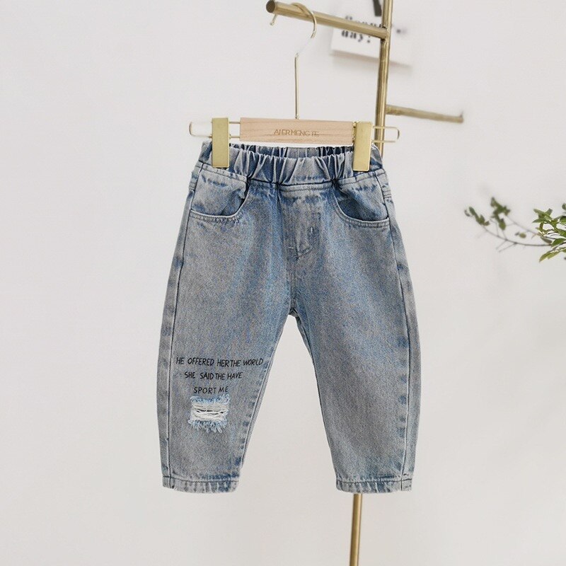 Children's Korean-style ripped jeans letter printed trousers spring and autumn boy pants street trend denim trousers: 7T 130cm