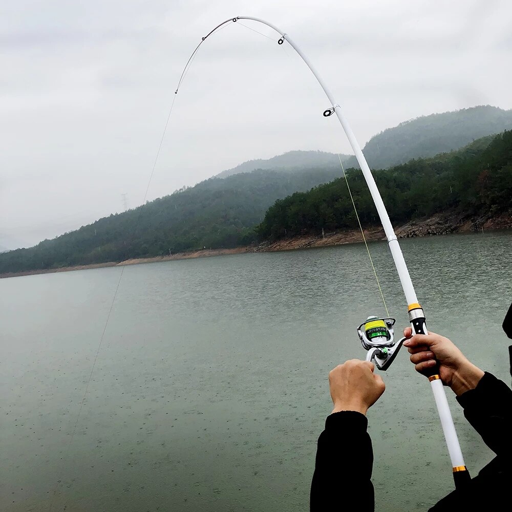 Canna da pesca bianca a lancio lungo canna da pesca dura in fibra di carbonio FRP canna da pesca telescopica regolabile