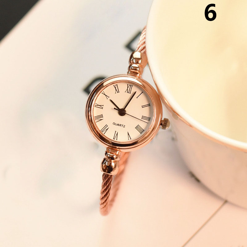 1 stk dame dame jente student håndledd kvarts klokke mini rund legering vintage xin: Størrelse 6
