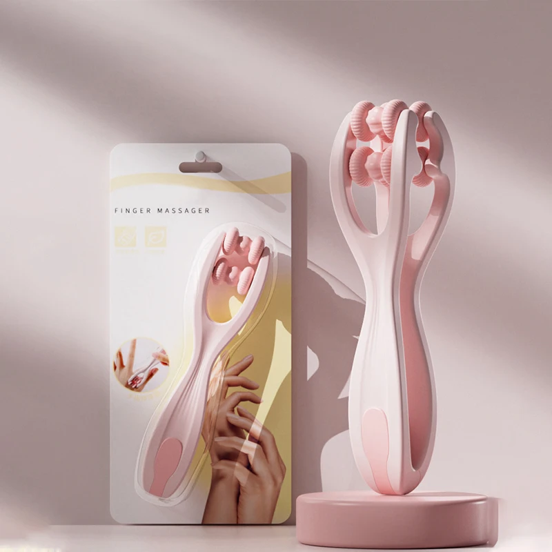Vingermassageapparaat met dubbele rij rollers, eenvoudig in gebruik, verlicht vingervermoeidheid, bevordert de bloedsomloop, draagbaar vingermassageapparaat.: Roze