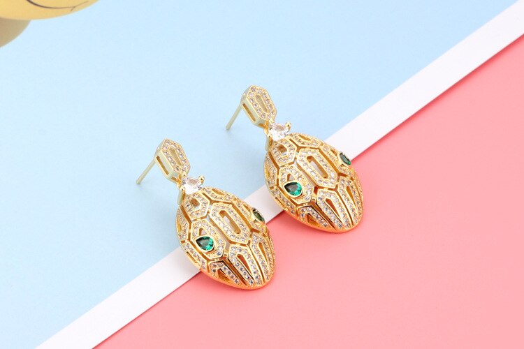 incrusté hao pierre creuse boucles d'oreilles femme ovale vert oeil serpent animal boucles d'oreilles simple personnalité boucles d'oreilles bijoux