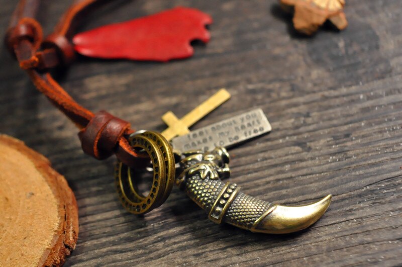 Men&#39; Jewelry hide cord Antique bronze dragon knife Pendant Necklace Vintage Wolf Tooth Dragon Titanium Pendant Necklace 1109