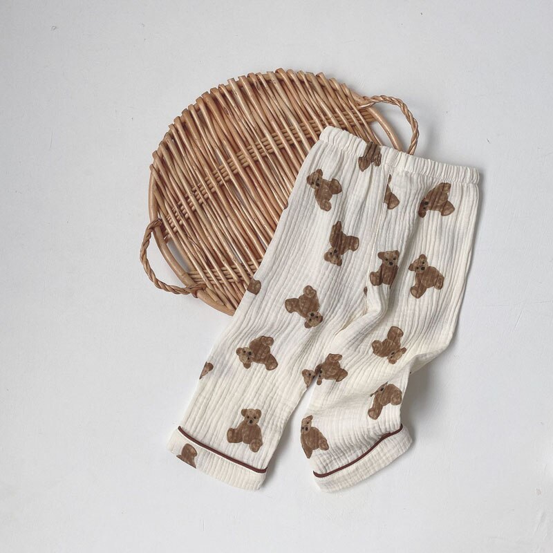 Pigiama per bambini primavera autunno Cardigan e pantaloni orso stampato manica lunga Comfort carino neonato ragazza cotone Musline filato indumenti da notte