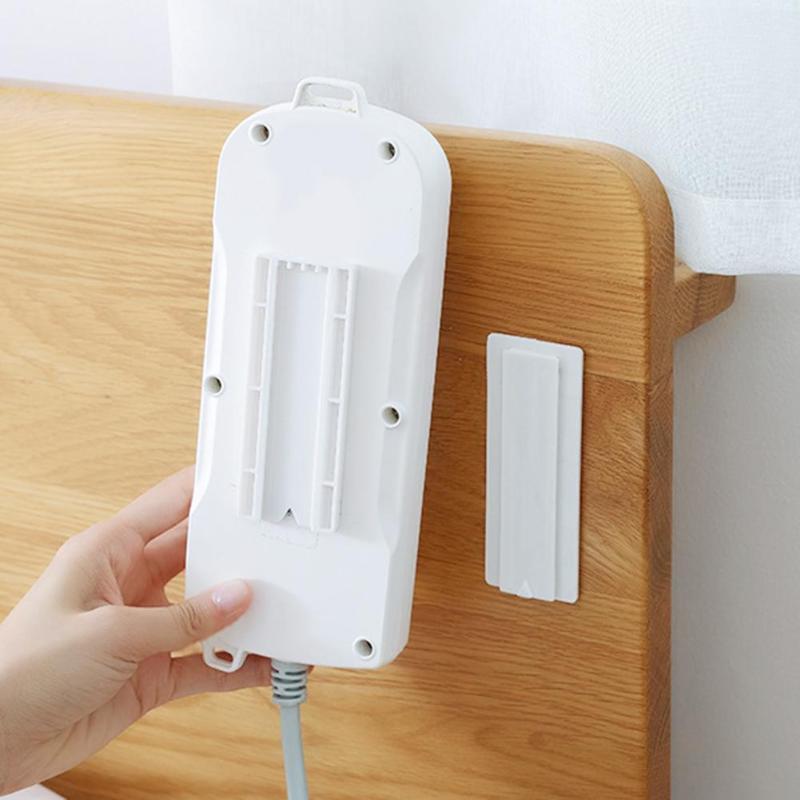 Wall-Mount Power Strip Houder Naadloze Sticker Zelfklevende Home Plug Rack