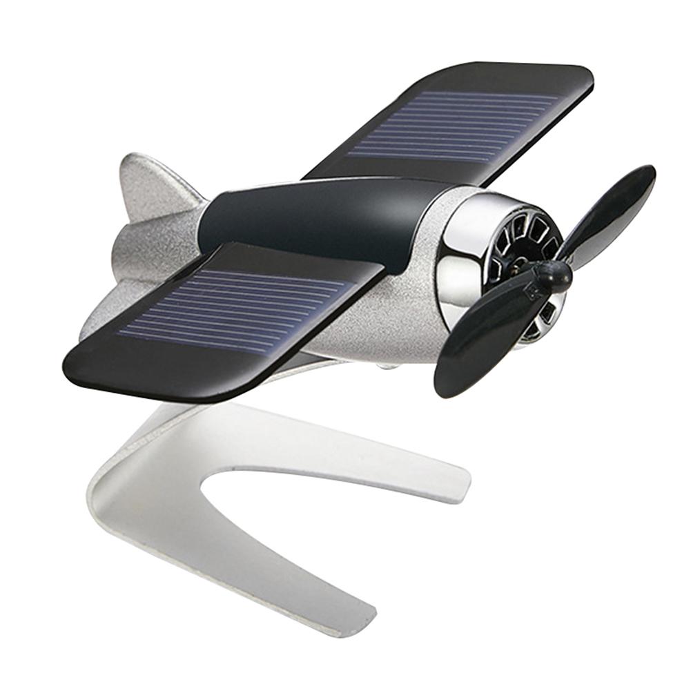 Bil dekoration aromaterapi fly dekoration skridsikker måtter legering solenergi rotere fly instrumentbræt solid bil styling