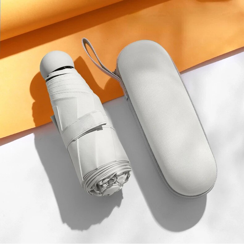 Kapsel Regenschirm klein und tragbar einfarbig Sonnenschirm für Frauen und Regen Dual-Use-Schutz: Beige